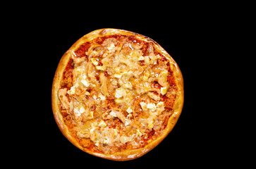 Pizza, a traditional Italian snack. Lots of ingredients, cheese, parmesan, salami, tomatoes, sauce. Top view, round, not cut. Isolated on black background.