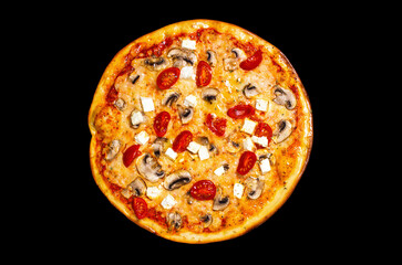 Pizza, a traditional Italian snack. Lots of ingredients, cheese, feta cheese, champignon mushrooms, tomatoes, sauce. Top view, round, not cut. Isolated on black background.