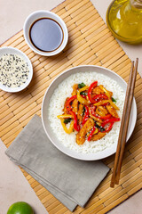 Rice with fried chicken, pepper and sesame. Asian food.