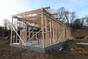 New house construction in the winter, wood framing.