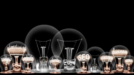 Group of light bulbs in a row going from dark to light with Digital Marketing, Brand, SEO, Business, Advertising and Strategy fiber text on black background. High quality 4k video.