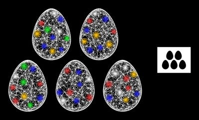 Glowing crossing mesh eggs with multicolored glowing spots. Illuminated vector model created from eggs pictogram. Sparkle constellation wired eggs, on a black backgound.