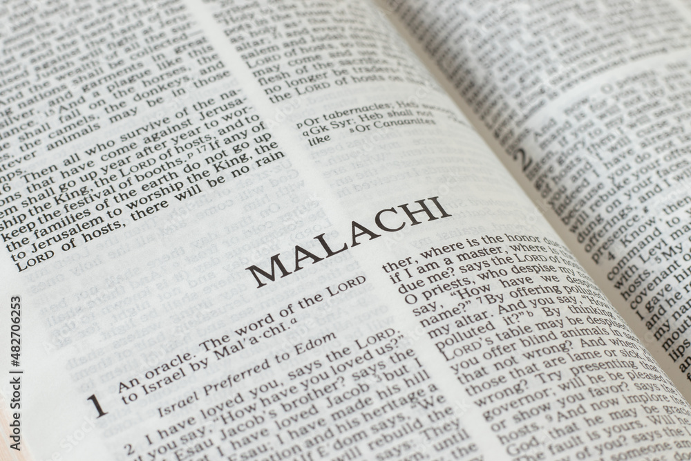 Wall mural malachi open holy bible book close-up. old testament scripture prophecy. studying the word of god je - Wall murals
