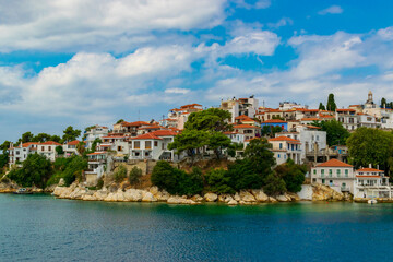 Fototapeta na wymiar Skiathos, Greece, old port with a blue sky