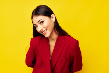 Fototapeta premium portrait pretty woman attractive look cosmetics red jacket studio model unaltered