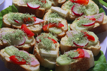 Club sandwich with sausage on a white plate. Club sandwich with cheese and green salad food traditional homemade