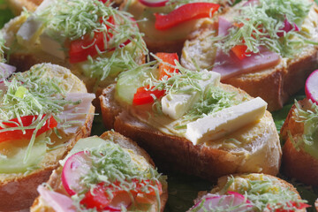 Club sandwich with sausage on a white plate. Club sandwich with cheese and green salad food traditional homemade
