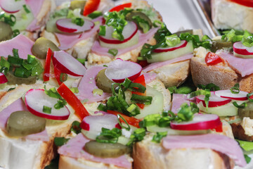 Club sandwich with sausage on a white plate. Club sandwich with cheese and green salad food traditional homemade