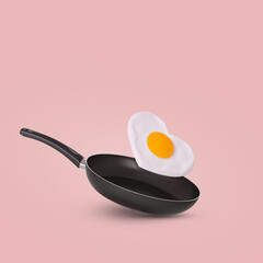 Creative idea with a frying pan and a flying fried egg in heart shape on a bright pink background.