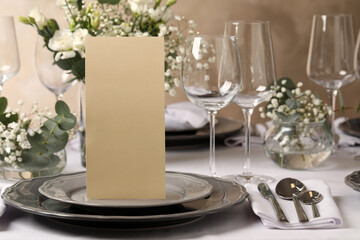 Stylish elegant table setting for festive dinner in restaurant