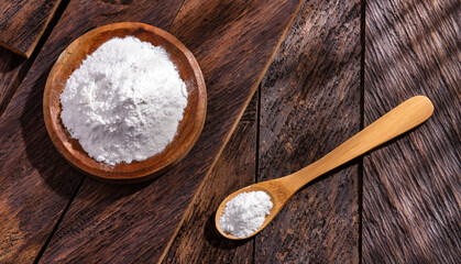Baking soda in the wooden bowl - Healthy food