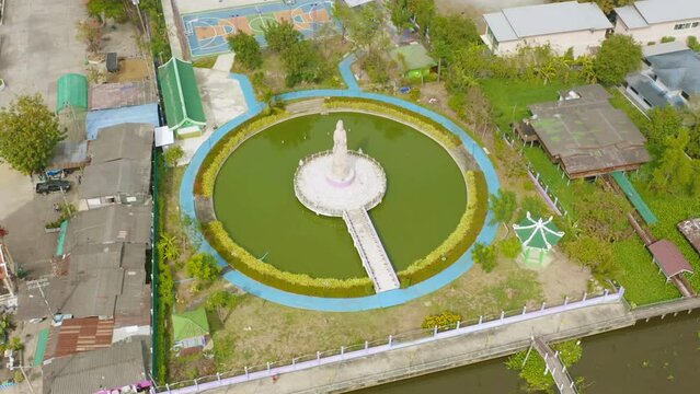 Aerial top view of goddess Guan Yin Shrine, Fo Guang Shan Thaihua Temple, Bangkok City, Thailand. Tourist attraction landmark.