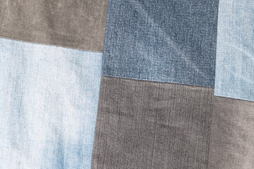 Denim jeans texture, patchwork denim jean fabric pattern.
