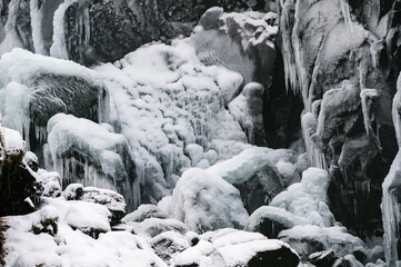 Latefossen Waterfall details during cold winter in Odda, Norway