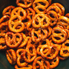 pretzels kitchen bowl pile crunchy snack trail mix closeup eating food background