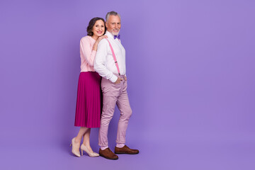 Full body profile photo of idyllic lovely partners hug weekend walk isolated on purple color...
