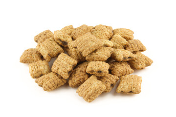 Cereals filled with delicious chocolate .Pillows made with whole grains and isolated on white background
