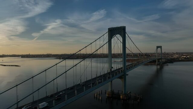 day flying alongside Bronx Whitestone Bridge revealing NYC to left