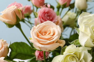 Bouquet of beautiful fresh roses on color background, closeup