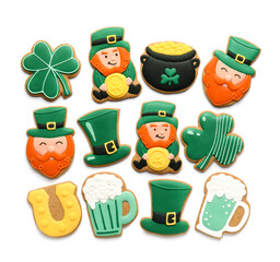 Tasty decorative gingerbread cookies for St. Patrick's Day celebration isolated on white background