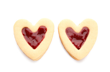 Obraz na płótnie Canvas Tasty cookies in heart shape on white background