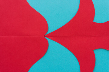 abstract paper background in turquoise blue and deep red - arrow