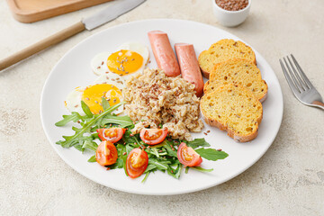Plate with tasty breakfast on grunge background