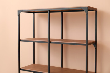Empty modern shelf unit near color, closeup