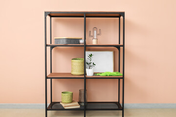 Modern shelf unit with stylish decor in room © Pixel-Shot