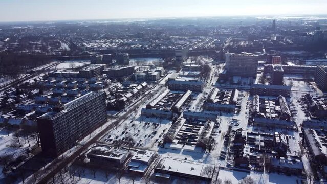 Aerial top view of Zwolle, surrounded by houses, green trees and canal