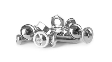 Different metal bolts and nuts on white background