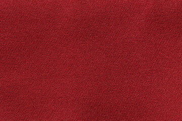 Fabric background with a dark red fabric cloth polyester texture.