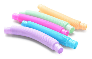 Different colorful Pop Tubes on white background