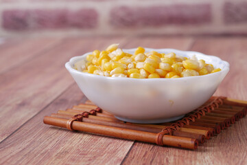 Sweet corns in a bowl on table ,