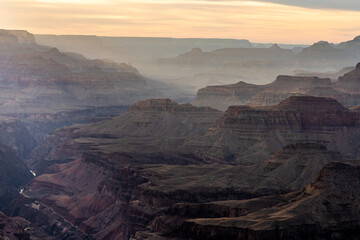 Fototapeta na wymiar Afternoon Light Mixes with Clouds Over Layers of the Grand Canyon