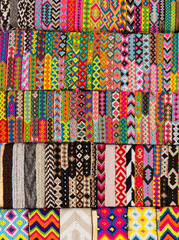 high angle of colorful handmade, handcrafted bracelets made by artisans in Colombia, South America. Colombian handicrafts