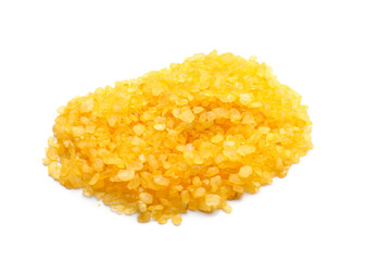 Heap of orange sea salt on white background