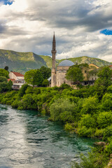 Koski Mehmed Mosque and Neretva river in famous Mostar town, Bosnia and Herzegovina