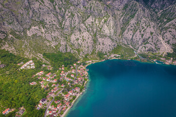 Aerial view of huge mountains and small towns of Kotor Bay, Montenegro