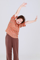 Healthy chinese senior woman happy and glad to cheer proposal of sale promotion notice and offer...