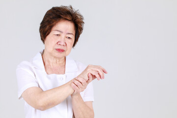 Elderly aunt stand tilt and twist with hands on waist as disappointed on body disease and tired of...