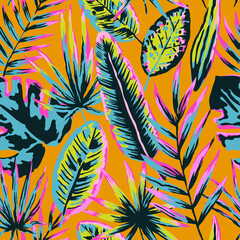 Seamless pattern with modern neon tropical leaves and plants for design and textile. © Yuliya