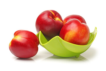 Nectarines on white background
