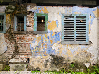 Fototapeta na wymiar Exterior of weathered old building in Ipoh, Perak, Malaysia.