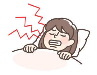 歯ぎしりをする女性