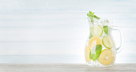 Lemonade pitcher with lemon