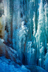 Fototapeta na wymiar Frozen waterfall in Glastonbury, Connecticut, with intesified natural color.