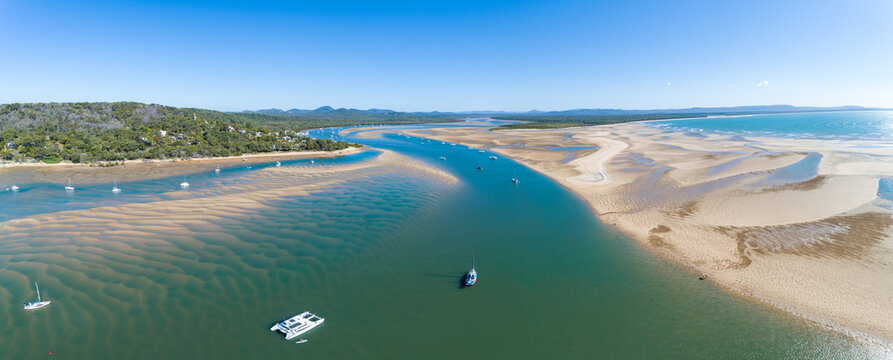 Aerial panorama of Round Hill Creek and Bustard Bay, the Town of 1770, QLD.