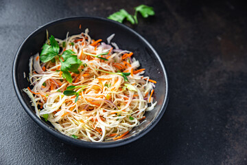 salad cabbage, carrot, onion fresh portion dietary healthy meal food dieter still life snack on the table copy space food background rustic top view keto or paleo diet veggie vegan or vegetarian food