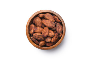 Flat lay of Cocoa beans in wooden bowl isolated on white background. Clipping path.